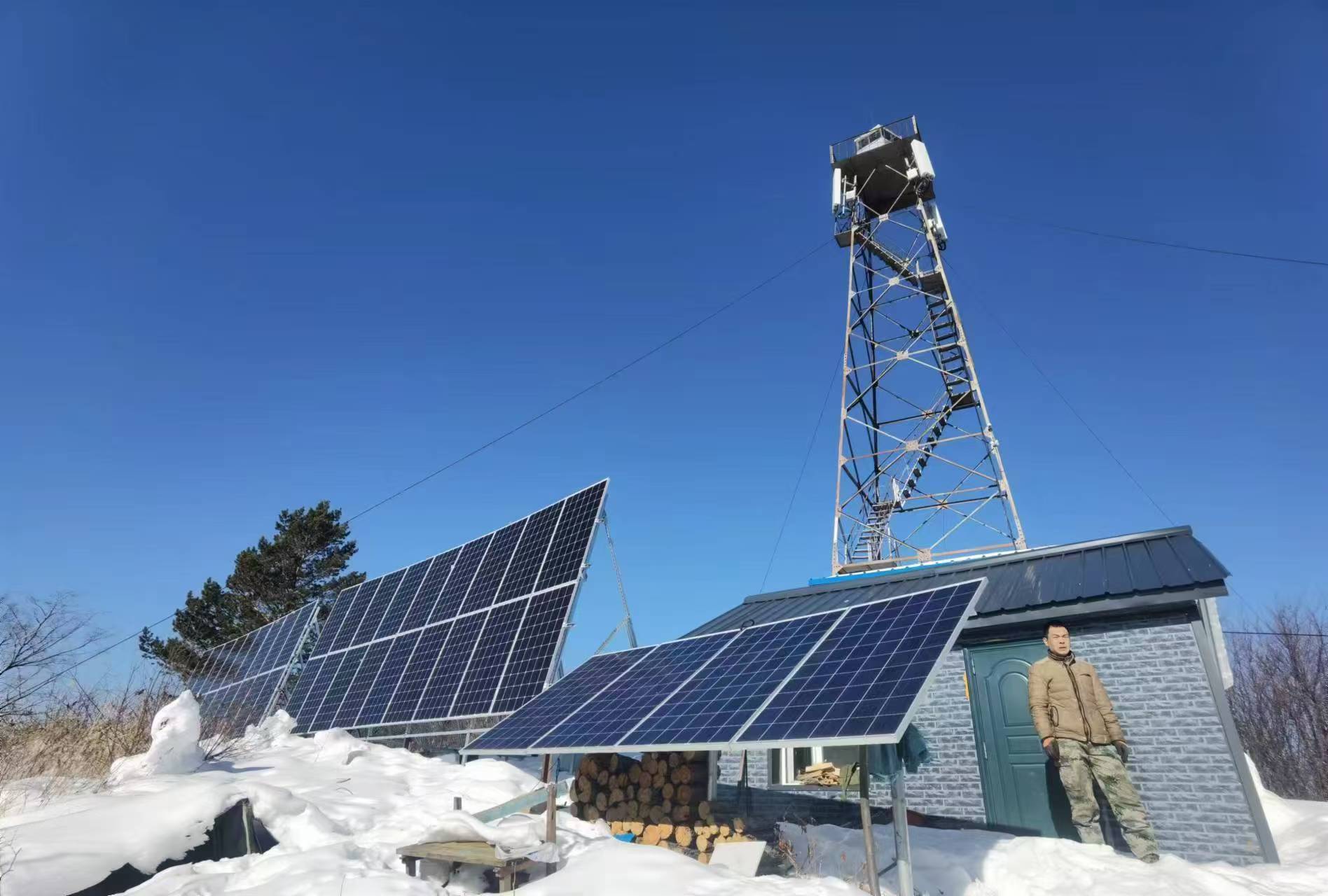 Off-grid solar power system and Gotopower battery storage powering a remote telecom tower in a snowy Mongolian landscape.